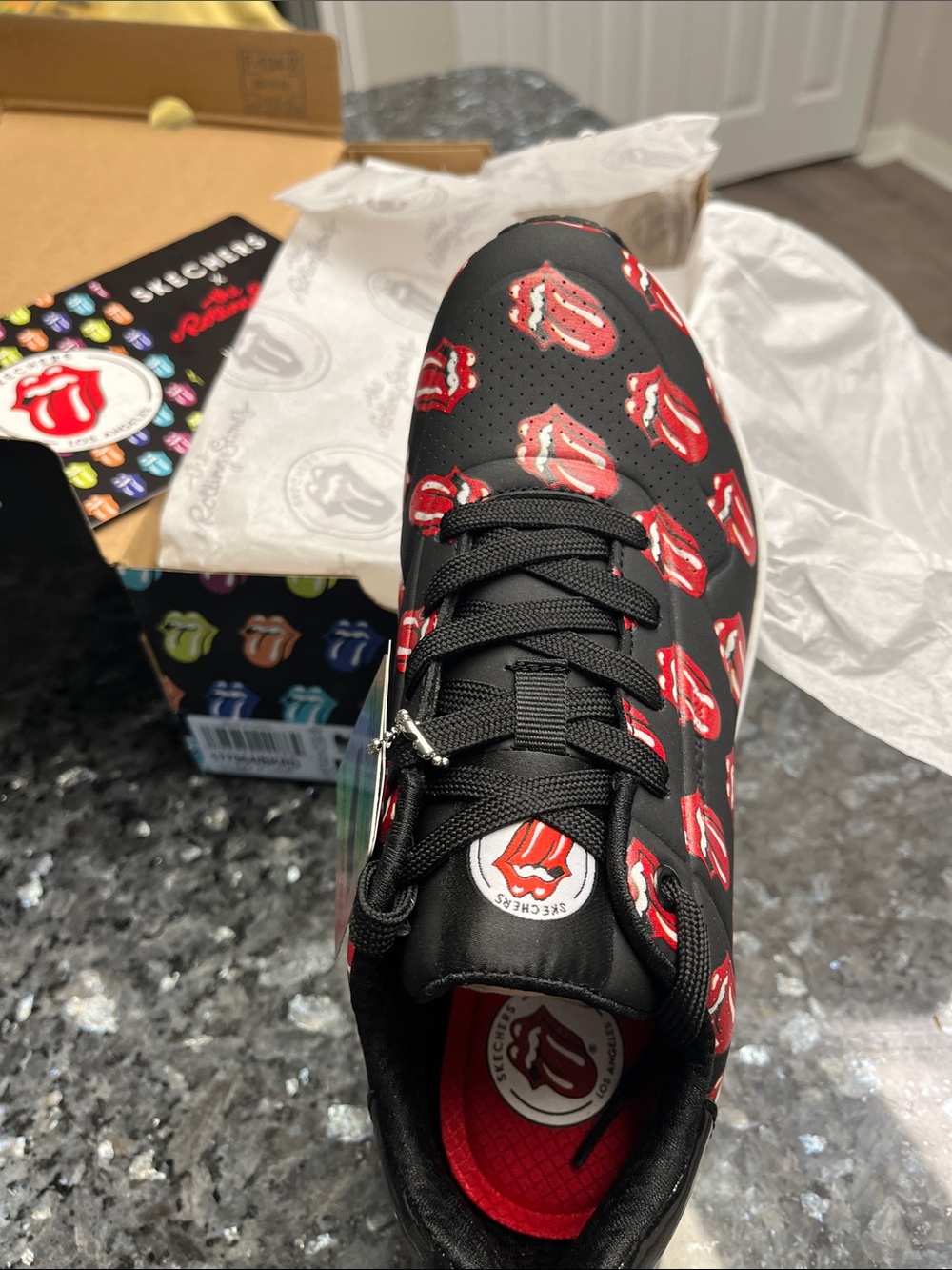 Skechers Black Sneakers with Red Tongue-and-Lips Print